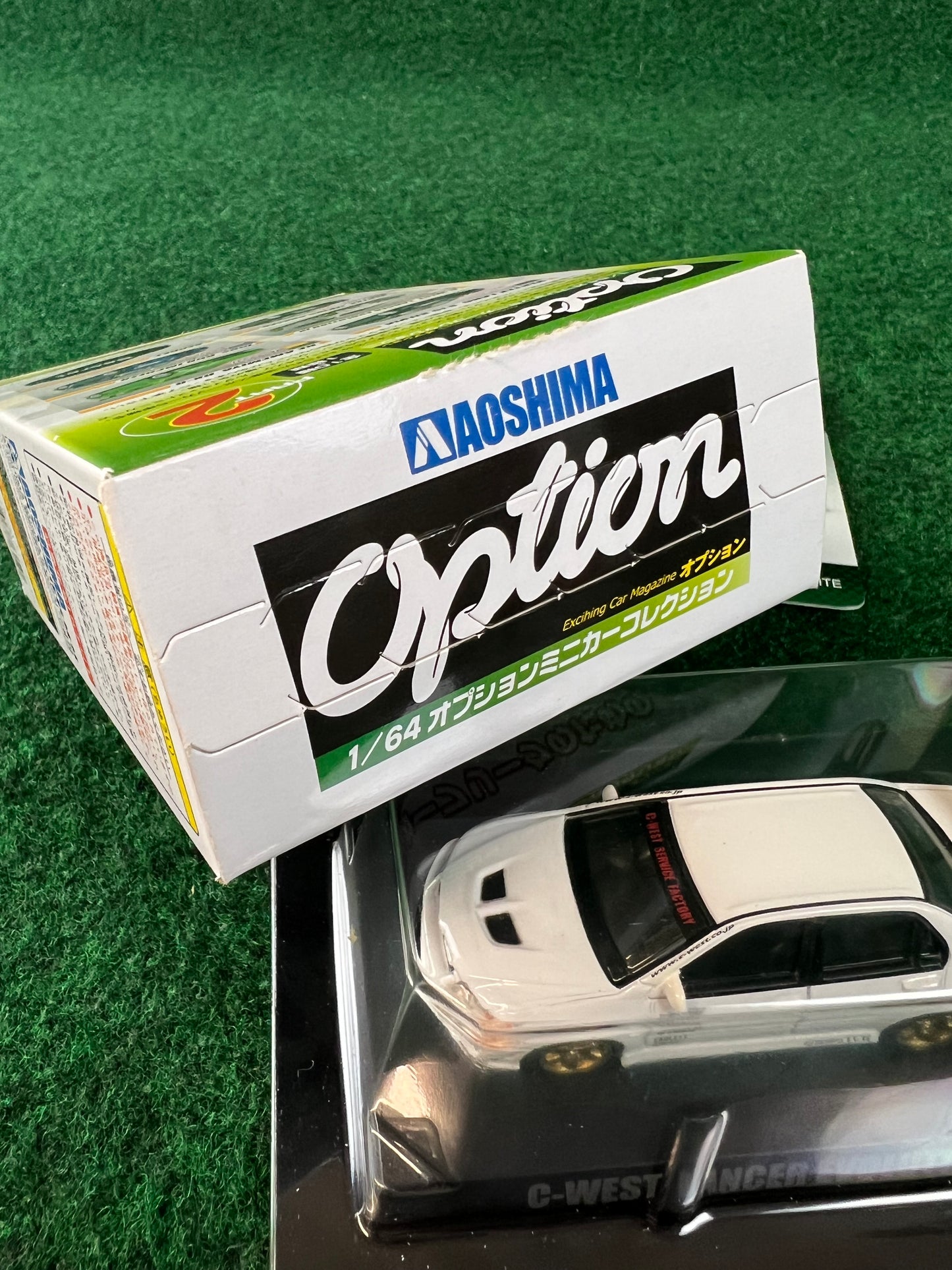 Aoshima - Option C-West Mitsubishi Lancer Evo IX (White) 1/64 Scale Diecast Car