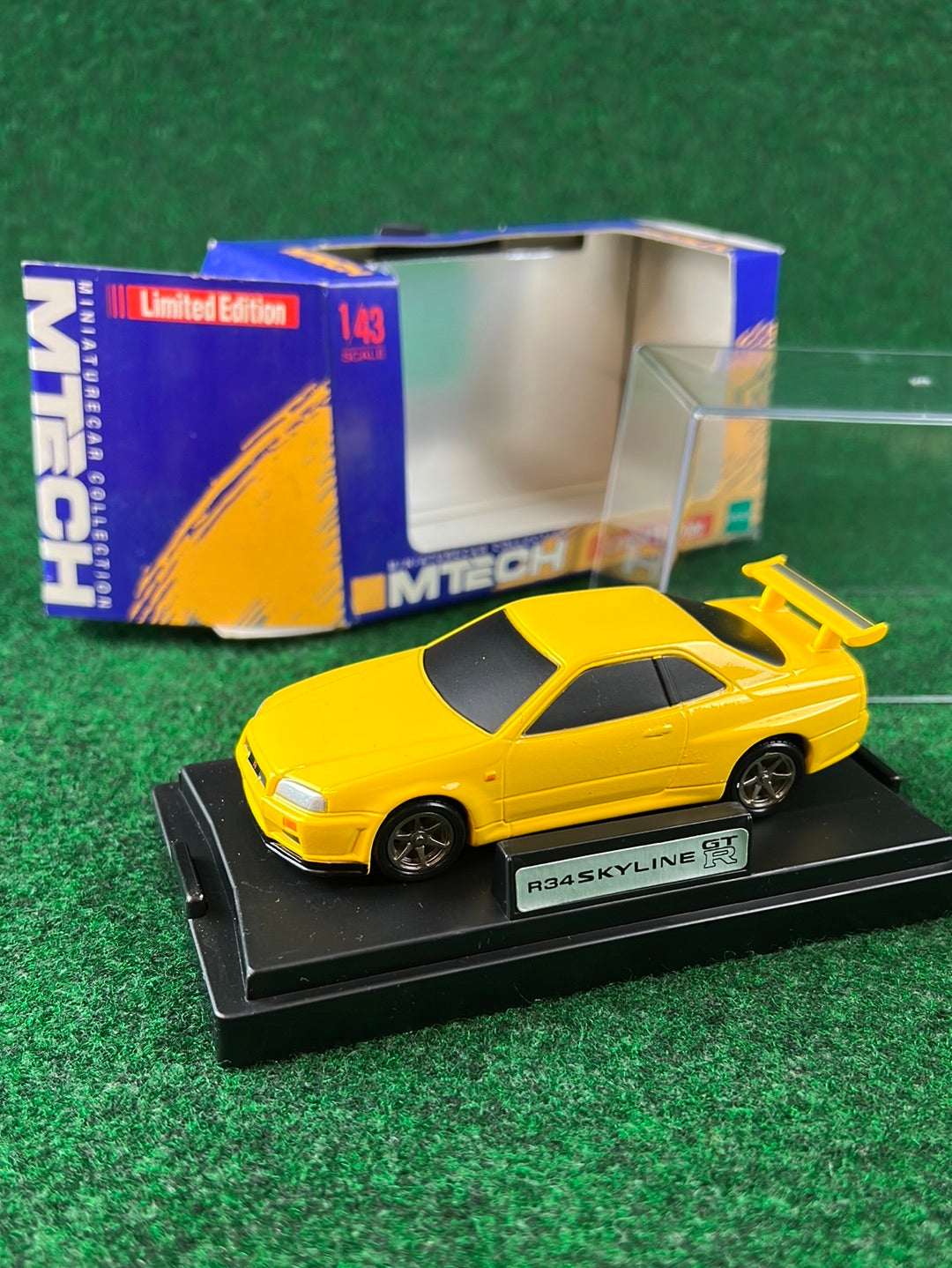 MTECH Limited Edition Nissan Skyline R34 GTR “EV1” Lightning Yellow Tribute Diecast