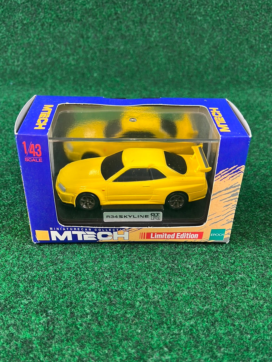 MTECH Limited Edition Nissan Skyline R34 GTR “EV1” Lightning Yellow Tribute Diecast
