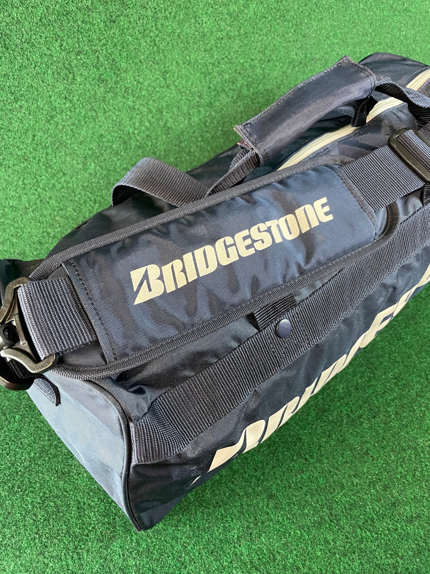 BRIDGESTONE - Vintage Navy Blue w/ White Lettering Red Duffle Bag