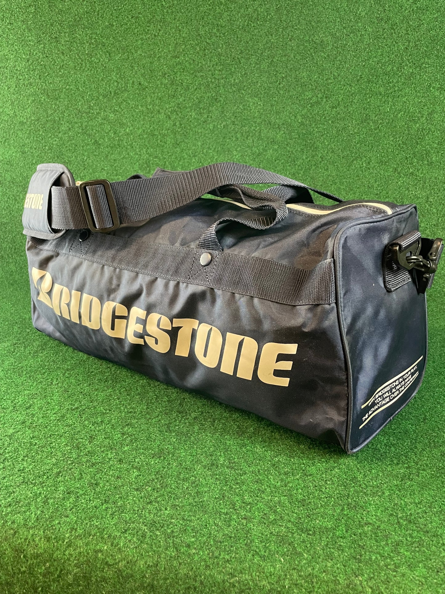 BRIDGESTONE - Vintage Navy Blue w/ White Lettering Red Duffle Bag