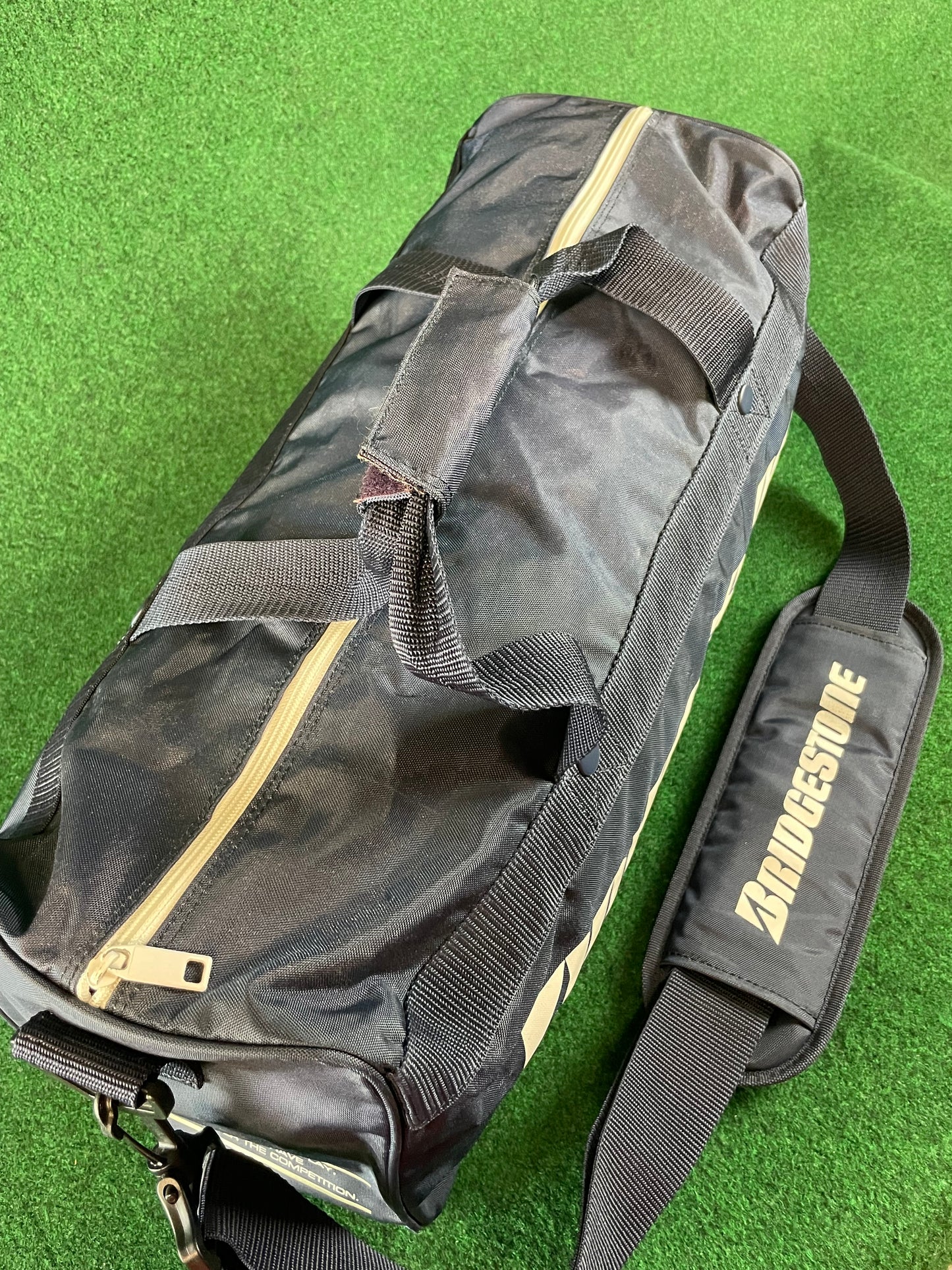 BRIDGESTONE - Vintage Navy Blue w/ White Lettering Red Duffle Bag