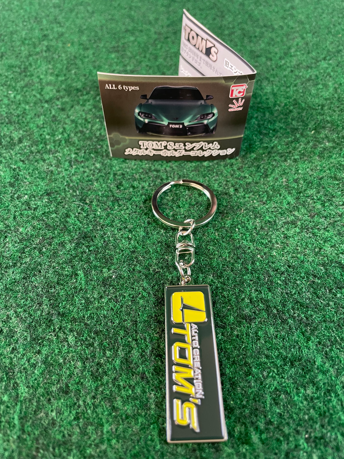 TOM'S Emblem Metal Keychain Collection - Brand Logo from 1974