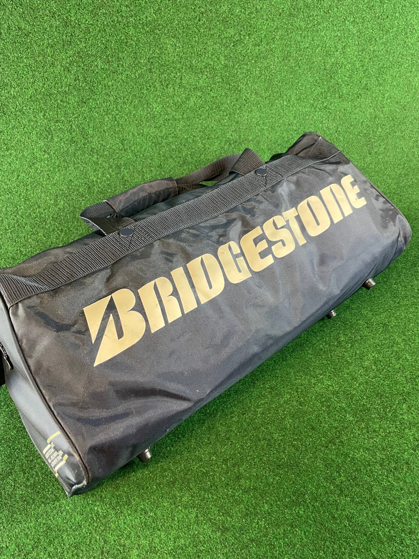 BRIDGESTONE - Vintage Navy Blue w/ White Lettering Red Duffle Bag
