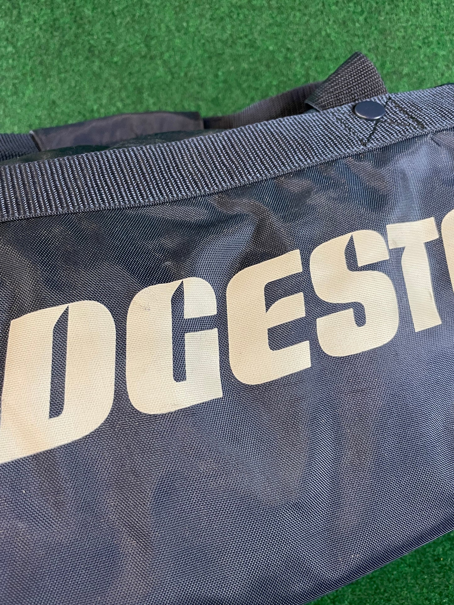 BRIDGESTONE - Vintage Navy Blue w/ White Lettering Red Duffle Bag