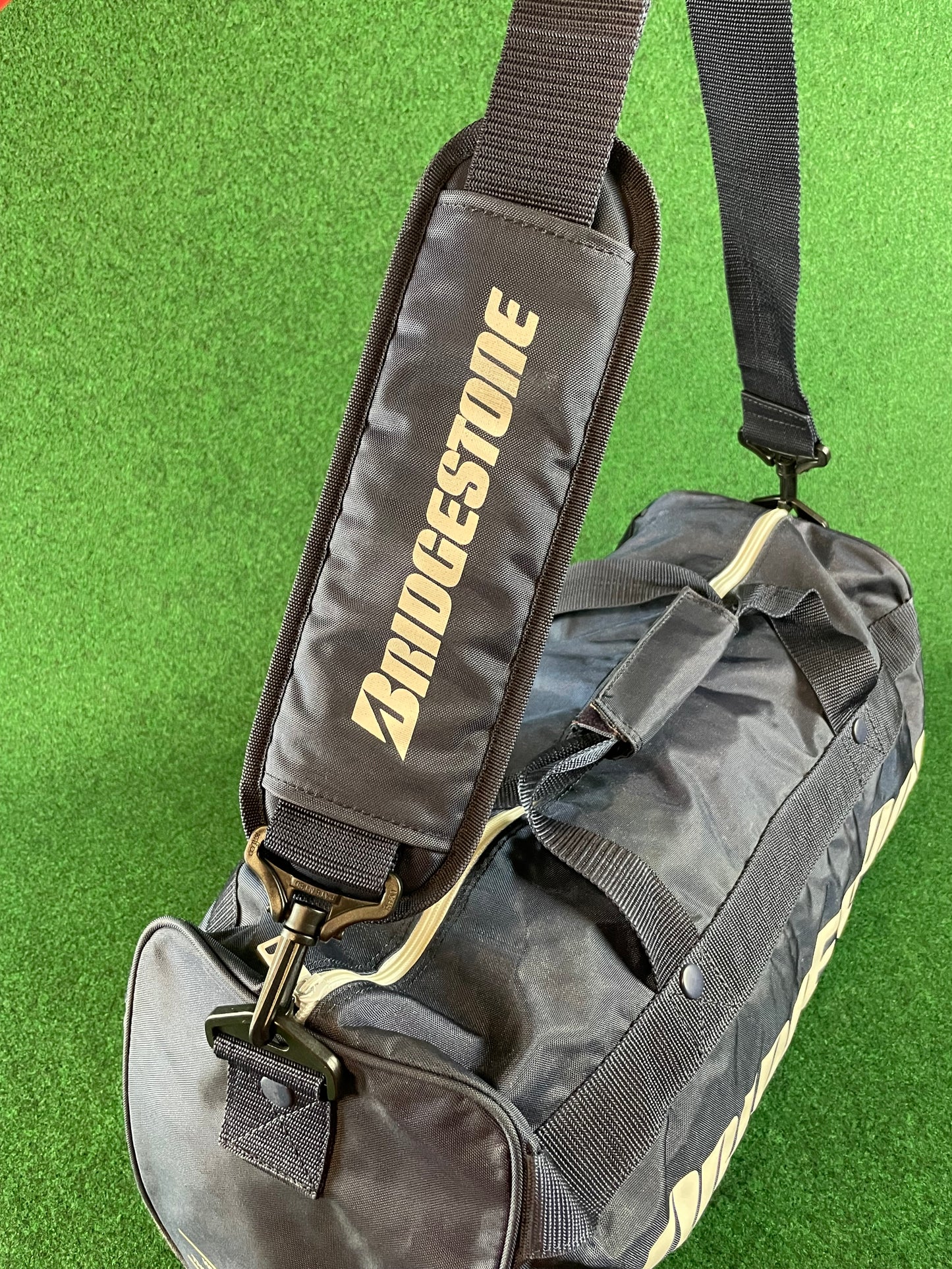 BRIDGESTONE - Vintage Navy Blue w/ White Lettering Red Duffle Bag