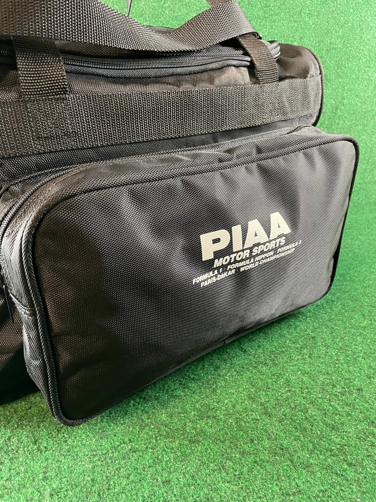 PIAA MOTOR SPORTS - Black Side Open Duffle Bag with Strap