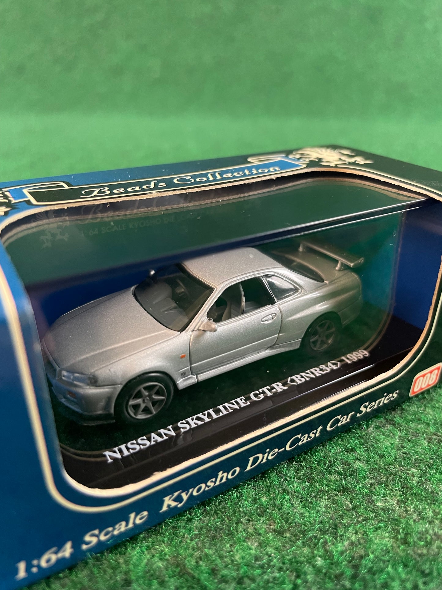 KYOSHO - Beads Collection Silver 1999 Nissan Skyline R34 GT-R 1/64 Scale Diecast