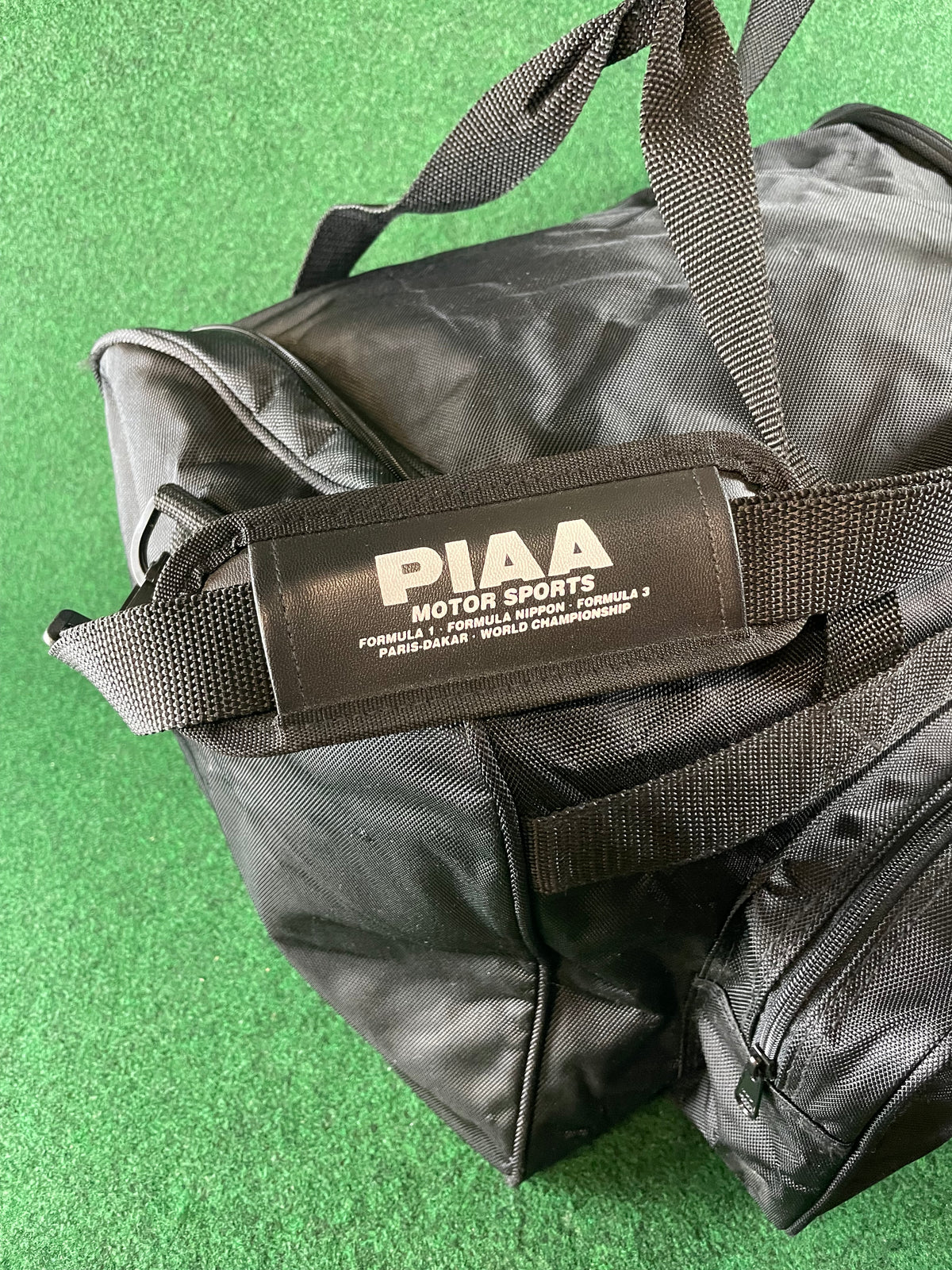 PIAA MOTOR SPORTS - Black Side Open Duffle Bag with Strap