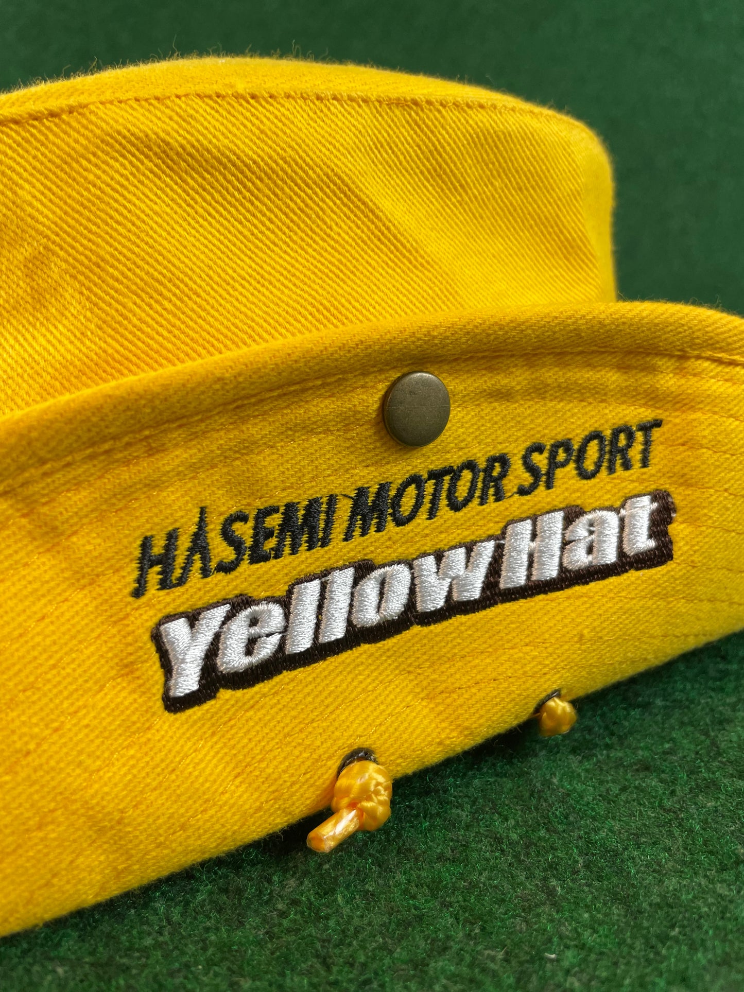 YMS SuperGT Yellow Hat & Hasemi Motor Sport Drawstring Bucket Hat