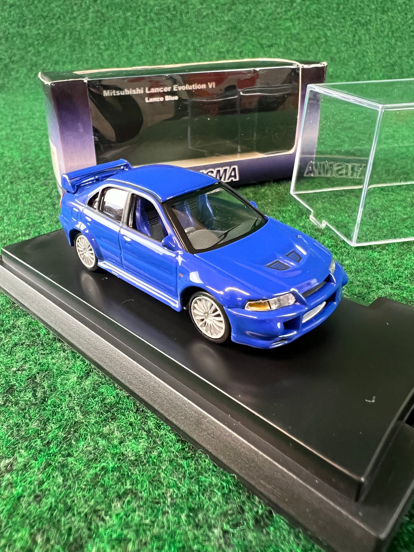 CARISMA - Mitsubishi Lancer Evolution VI (Blue) 1/64 Scale Diecast