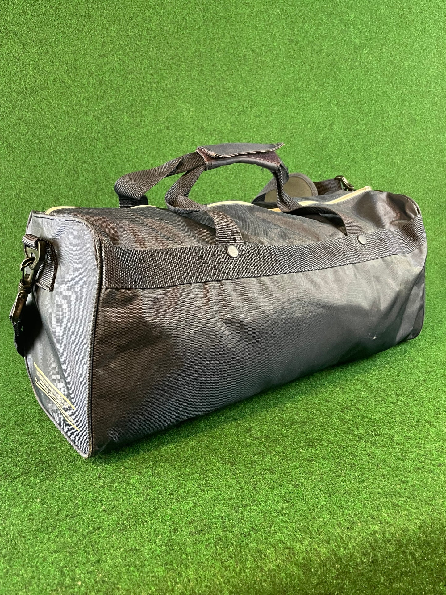 BRIDGESTONE - Vintage Navy Blue w/ White Lettering Red Duffle Bag
